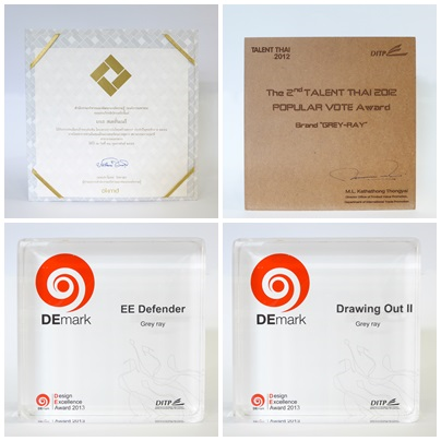 บนซ้าย : รางวัลไทยสร้างสรรค์ ขวา : รางวัลโครงการสร้างนักออกแบบ ล่างซ้าย : รางวัล DEmark ผลิตภัณฑ์ EE DEFENDER ขวา : รางวัล DEmark ผลิตภัณฑ์ DRAWING OUT II